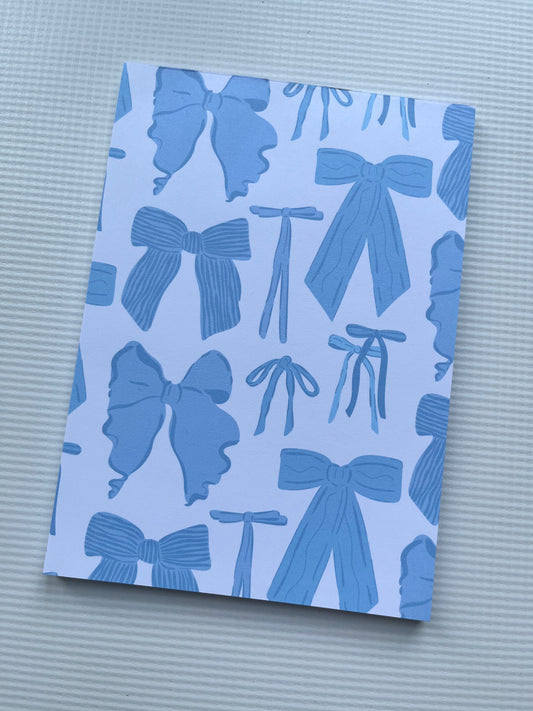 Blue bow notepad