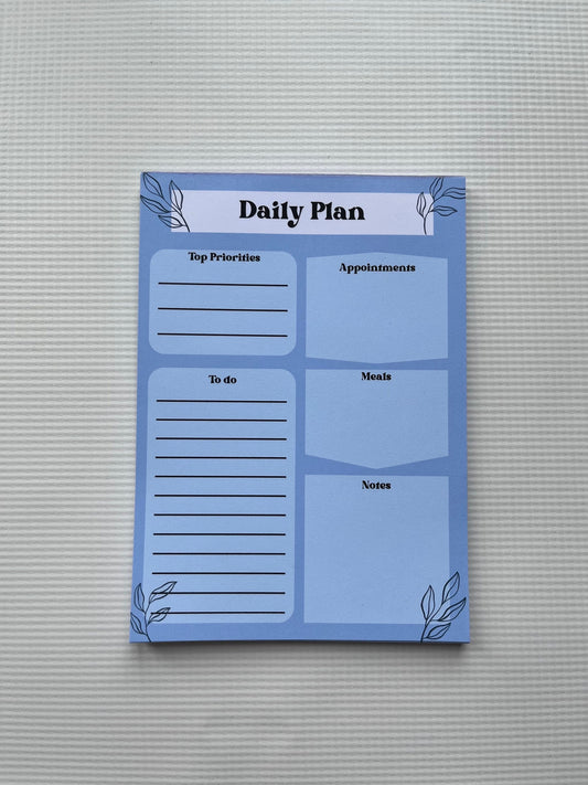 Blue daily planner notepad