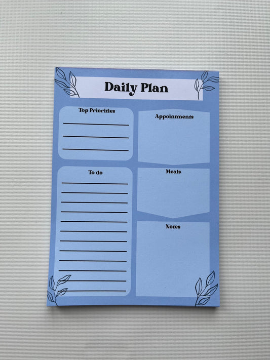 Blue daily planner notepad